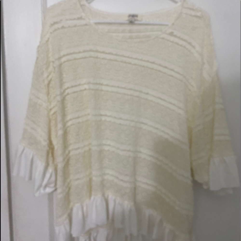 UMGEE ruffle and lace cream blouse.